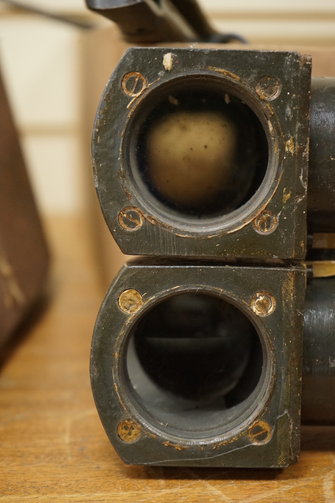 A collection of militaria including; a US Air Force camera Type N-6, a leather cased Bell & Howell Sportster camera and accessories, a pair of periscope binoculars, a leather cased compass by Goerz, Berlin